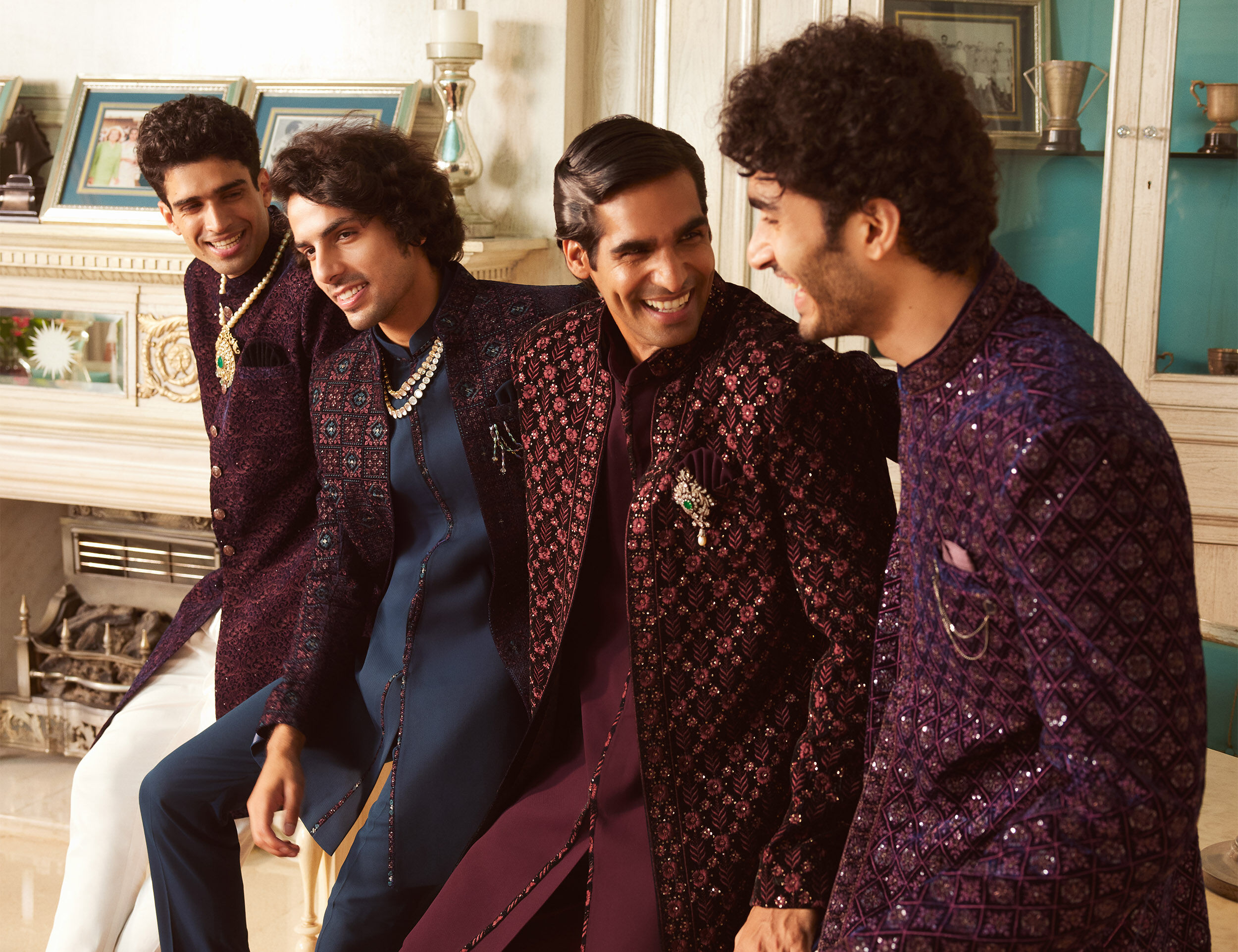 Groom and groomsmen wearing stylish and dashing indowestern sherwanis for wedding
